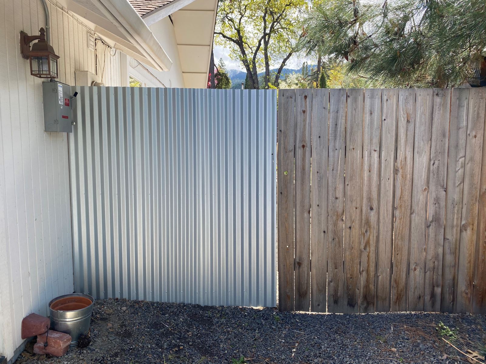 corrugated metal fence attachment